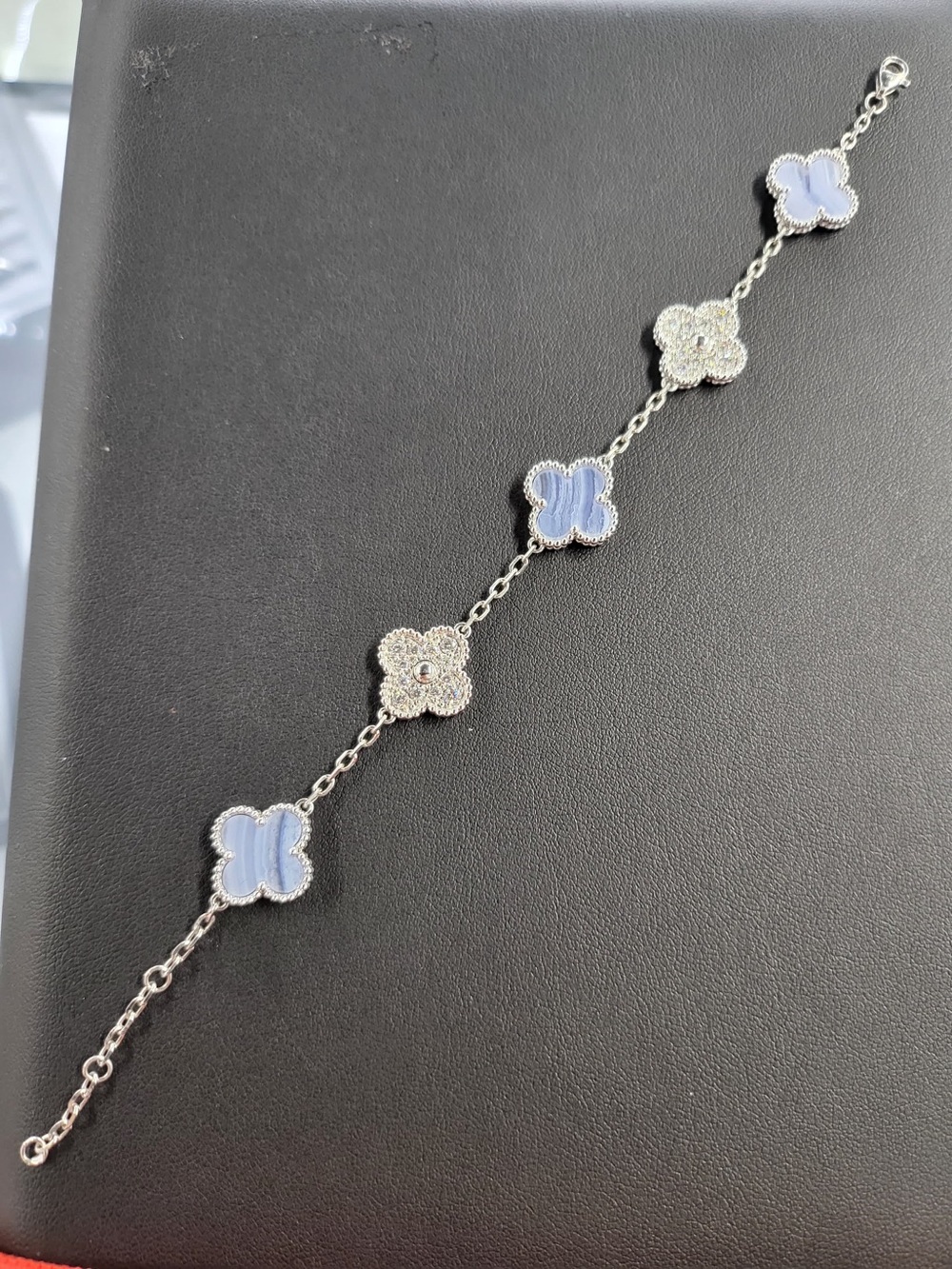 Platinum Bracelet with Diamonds and mother of pearl Light Blue Clover Motifs